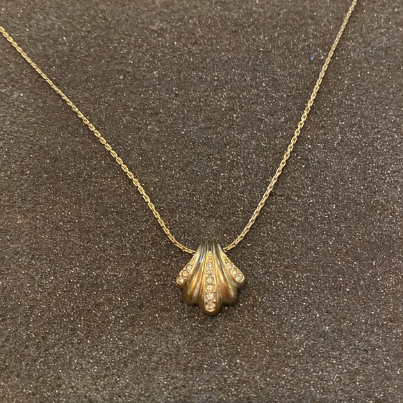 Christian Dior gold tone swish/shell necklace with rhinestones